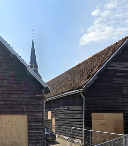 Transformatie monumentale schuur naar woningen